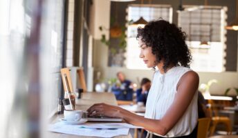 Woman working in a cafe