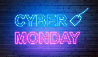 Cyber Monday text from an electric lamp on the wall