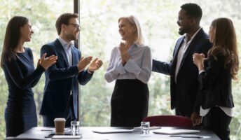 Employee being congratulated