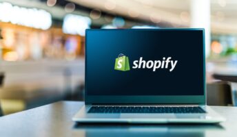 Shopify logo on laptop