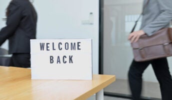 Office workers greeted by 'Welcome Back' sign