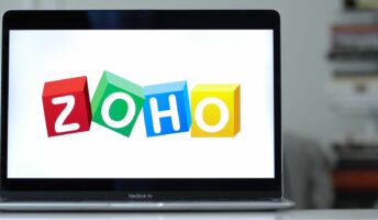 Zoho software logo open on MacBook Air screen