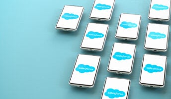 The Salesforce logo on a collection of phones.