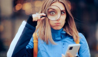 Woman Searching the Internet on her mobile Phone