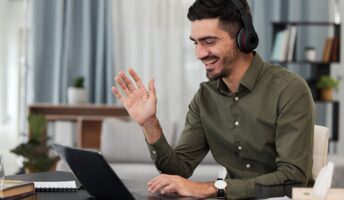 Man using a VoIP system