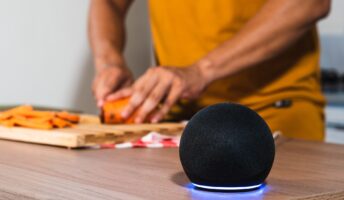 Alexa AI in a kitchen with someone cooking