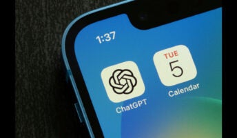 ChatGPT and '5' calendar icons in iPhone screen illustrating concept of GPT-5