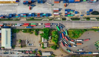 Fleets of trucks, seen from above.