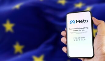 Meta's app on a phone screen, with the EU flag in the background.