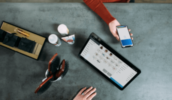 a top down view of a customer making a mobile payment using a modern point of sale system