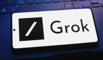 Grok logo on a phone screen.