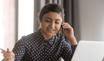 A woman takes a phone interview call.