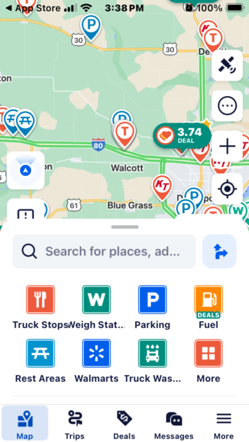 The Trucker Path mobile app's homepage includes a map and a search bar.